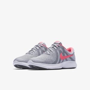 Grey and pink Nike tennis shoes